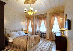 2 person executive suite with city view, french bed, private facilities (bath and shower), and breakfast
